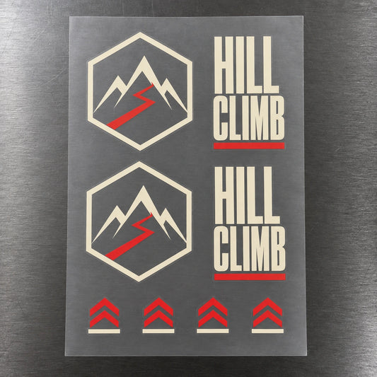 Complete upright gang sheet with mountain hexagons, HILL CLIMB lettering and ascent symbols separated by clear film.
