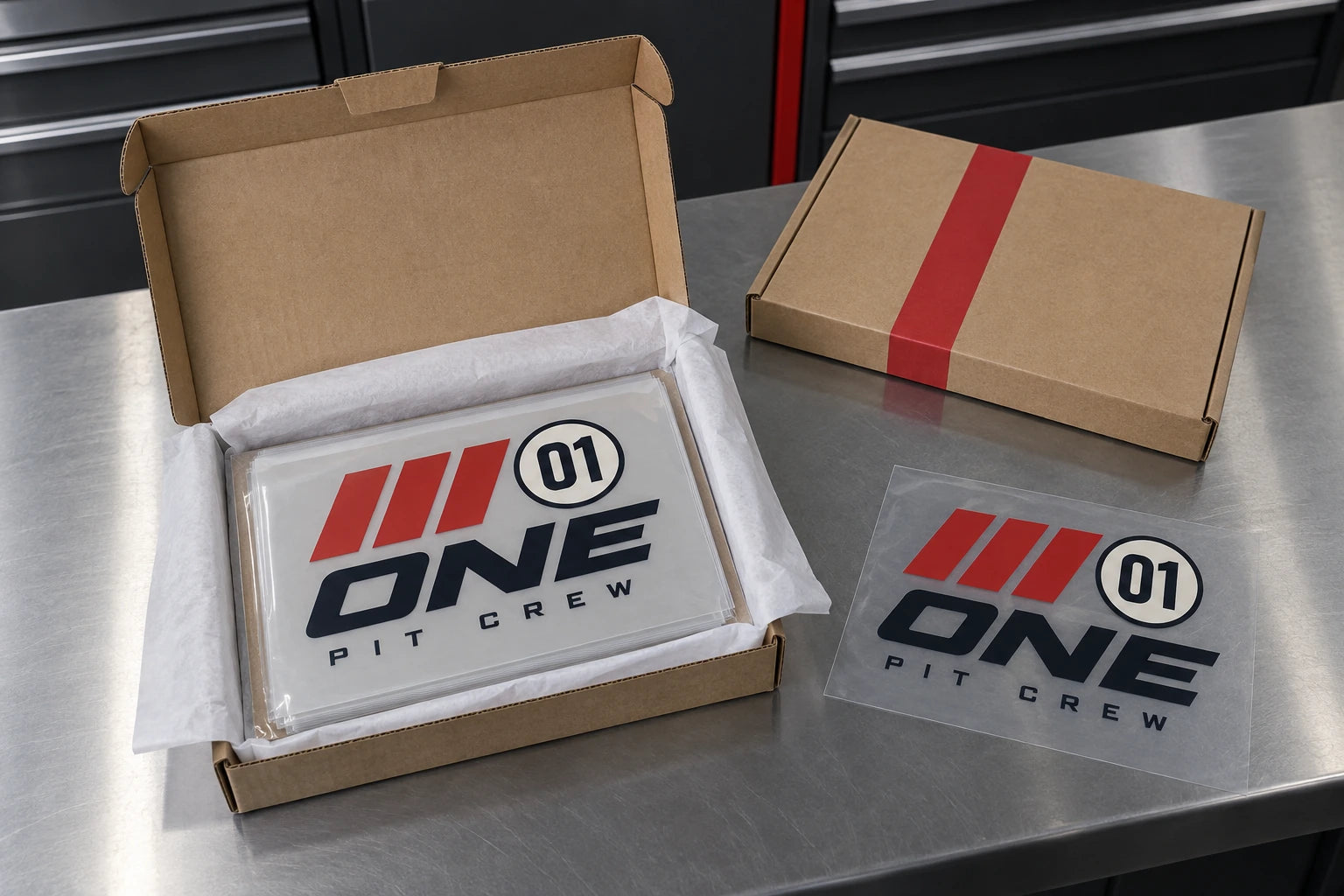 Transfer films and their protective packaging laid out for an order inspection.